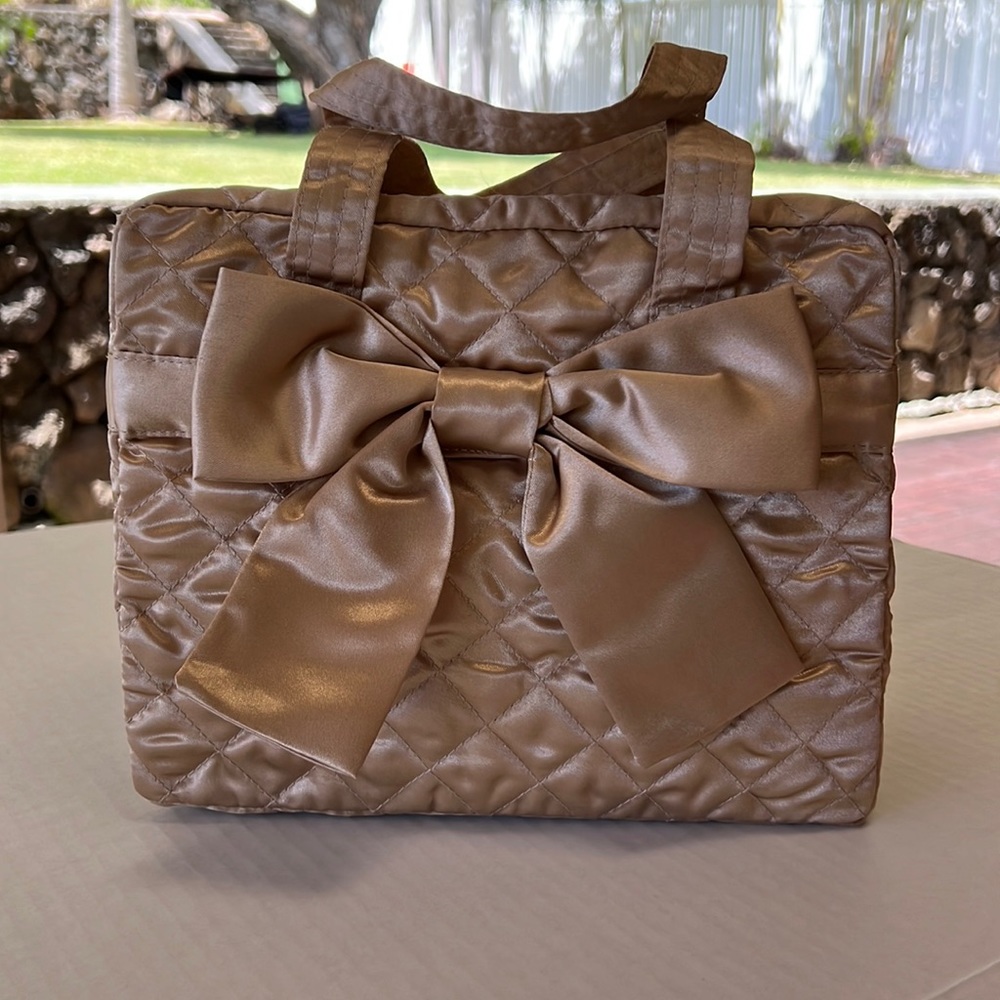 NWOT NaRaYa gold purse